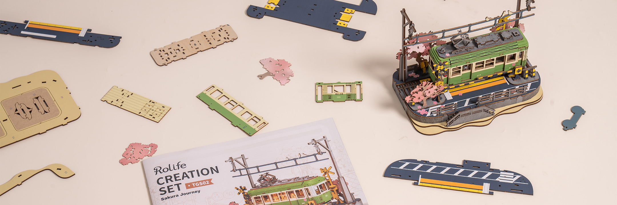 Rolife Sakura Densya DIY kit with wooden parts and instruction booklet