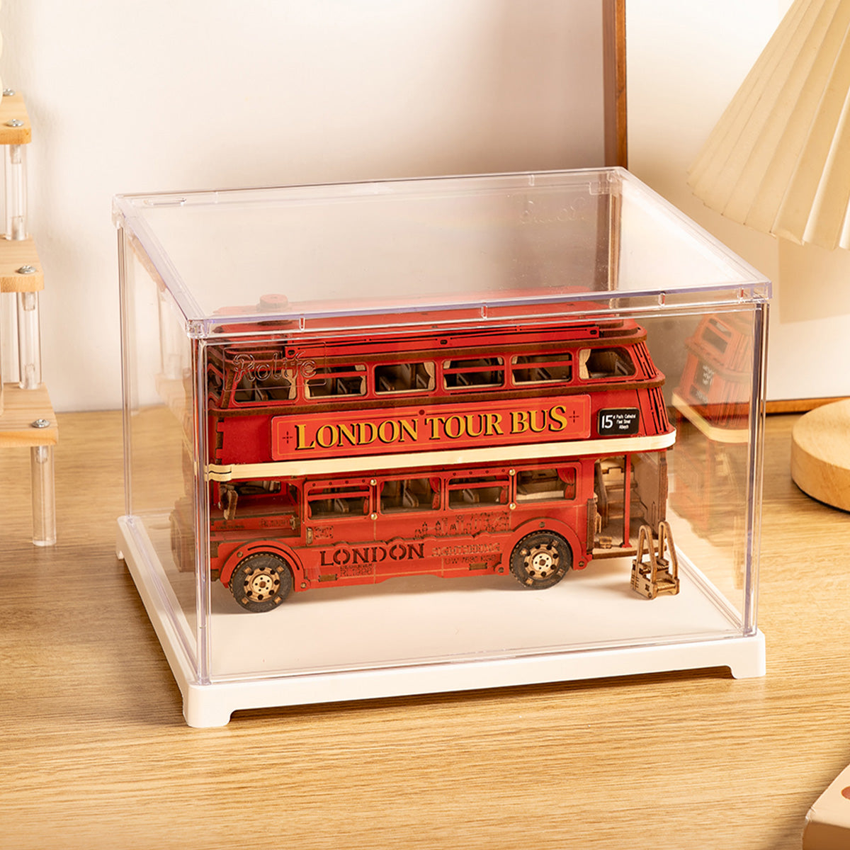 DF04L acrylic display box with a red bus model inside
