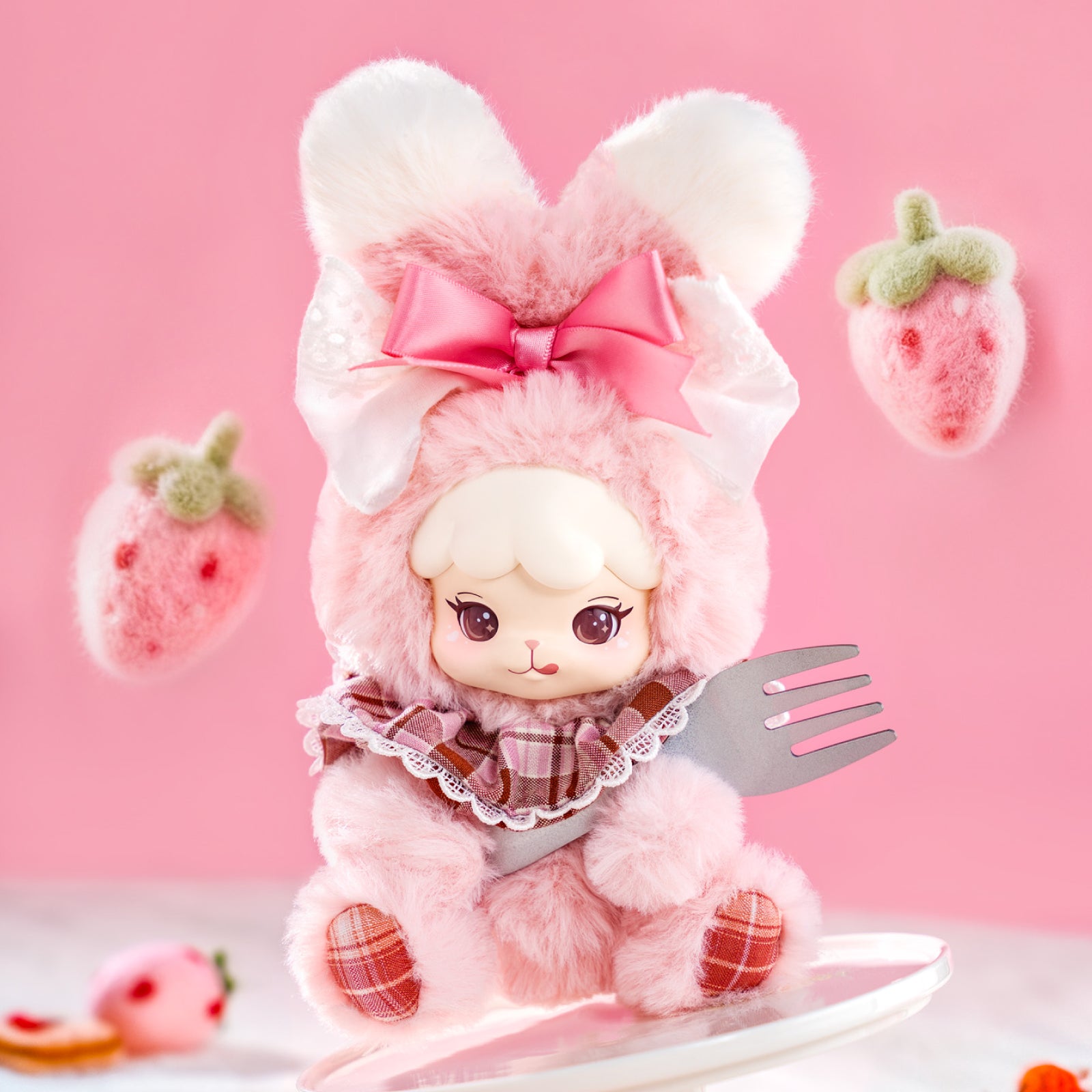 Cream Bunny plush pendant on a pink background