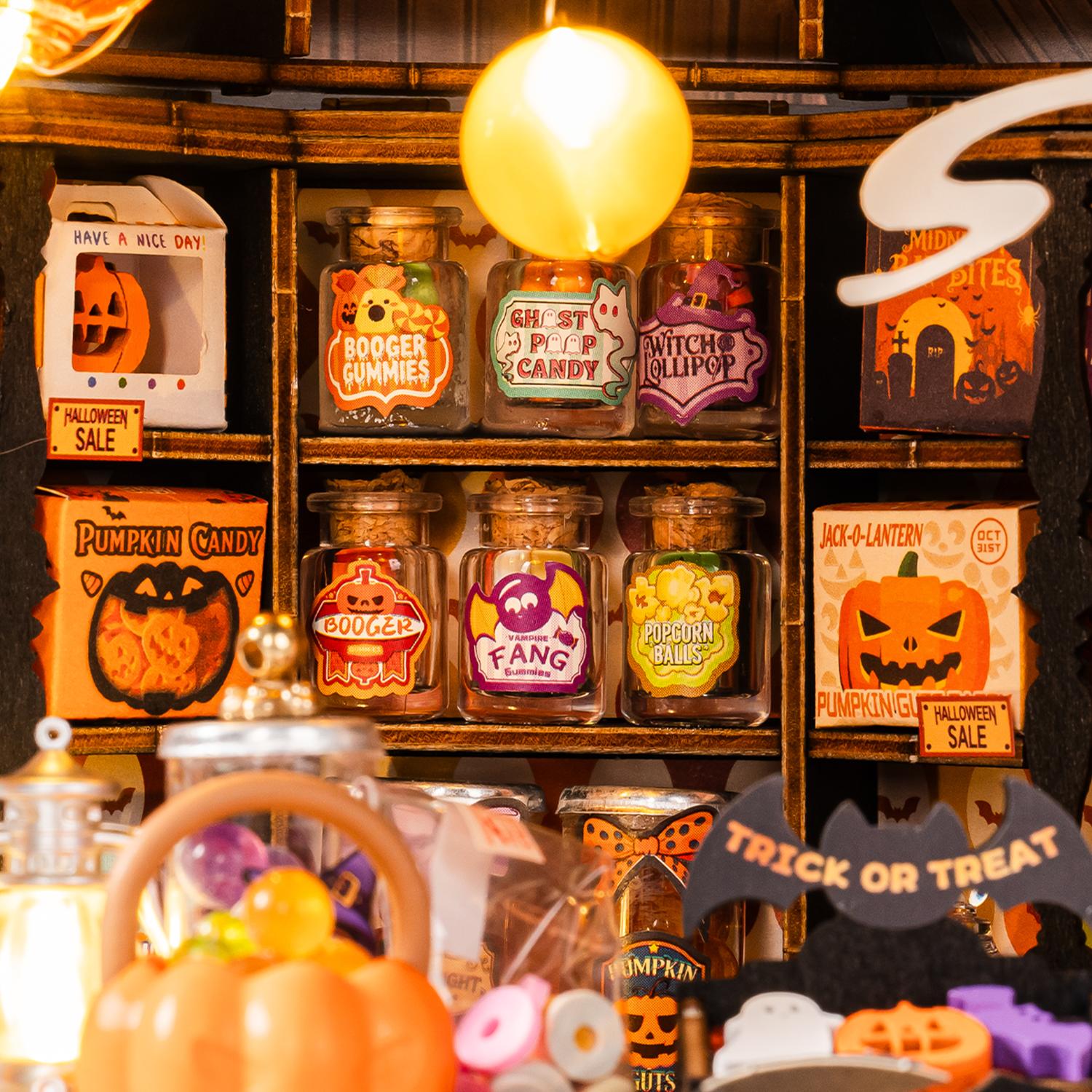 Rolife Haunted Candy House close-up of glowing candy jars and spooky shop shelves