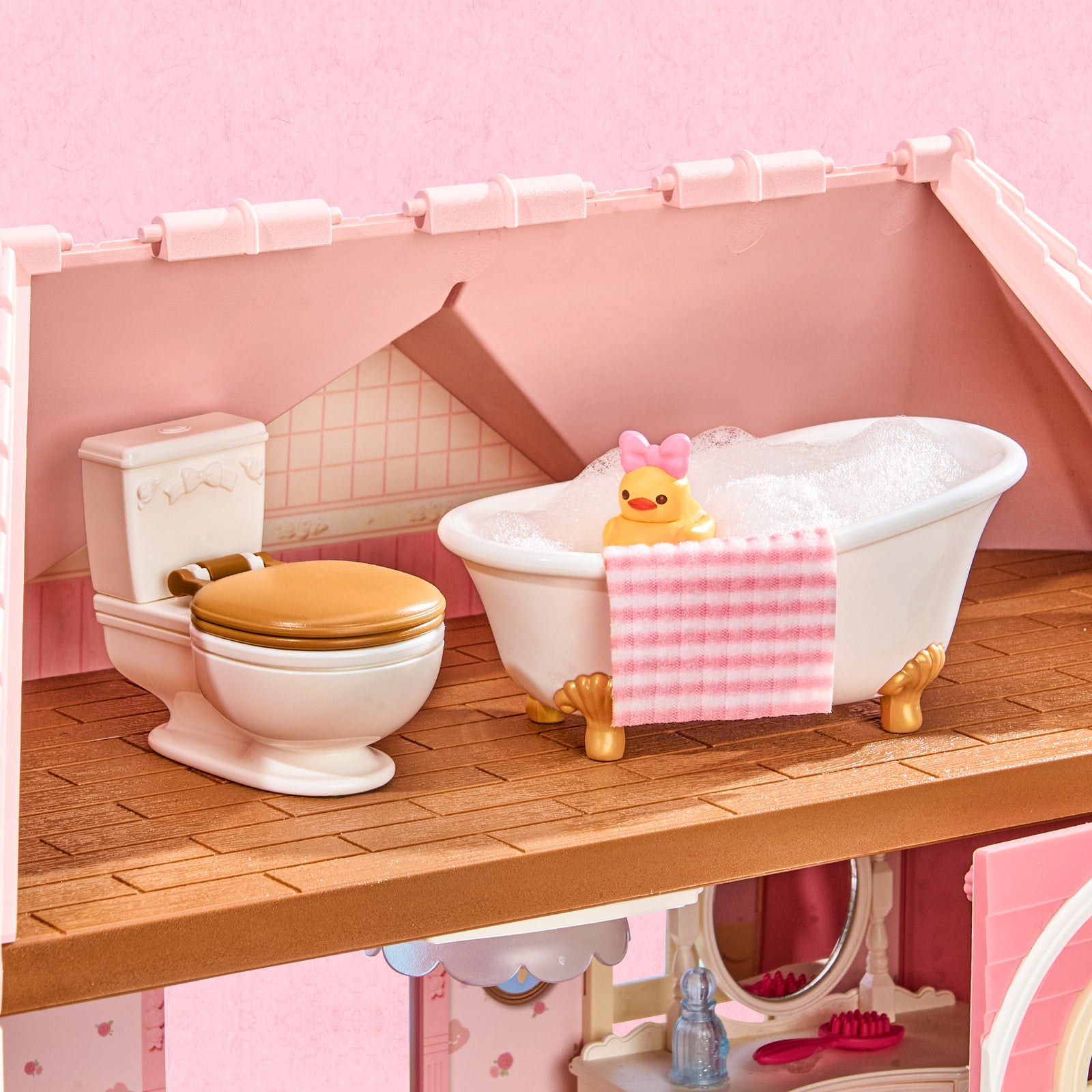 Rolife Fairy Rose Cottage HH001 bathroom detail with bathtub, toilet, towel, and duck decor.