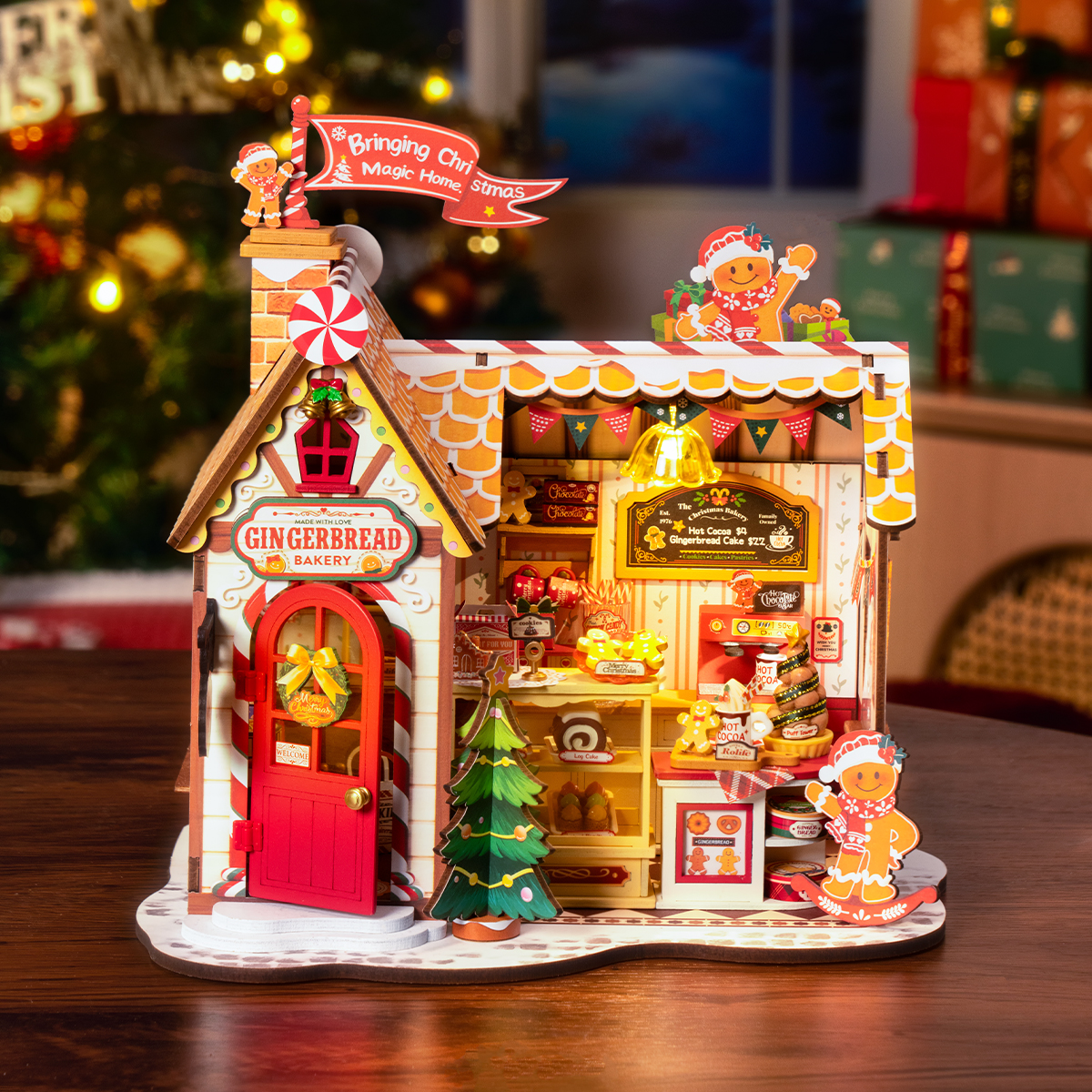 Gingerbread House DG176 glowing bakery display in a festive tabletop scene