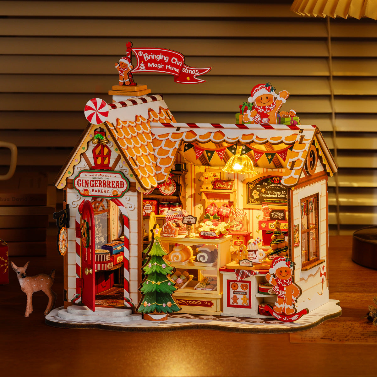 Gingerbread House DG176 illuminated miniature house on a shelf display