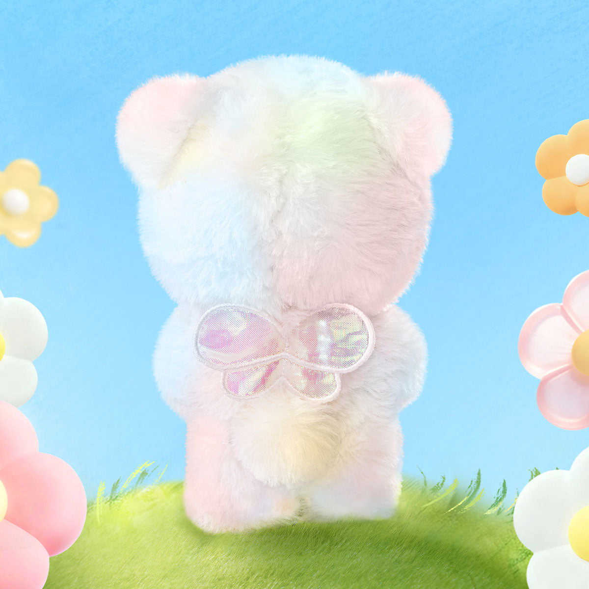 Rückansicht des Rolife Nanci Spring Bear MN003 Plüschanhängers mit Schleife und flauschiger Textur.