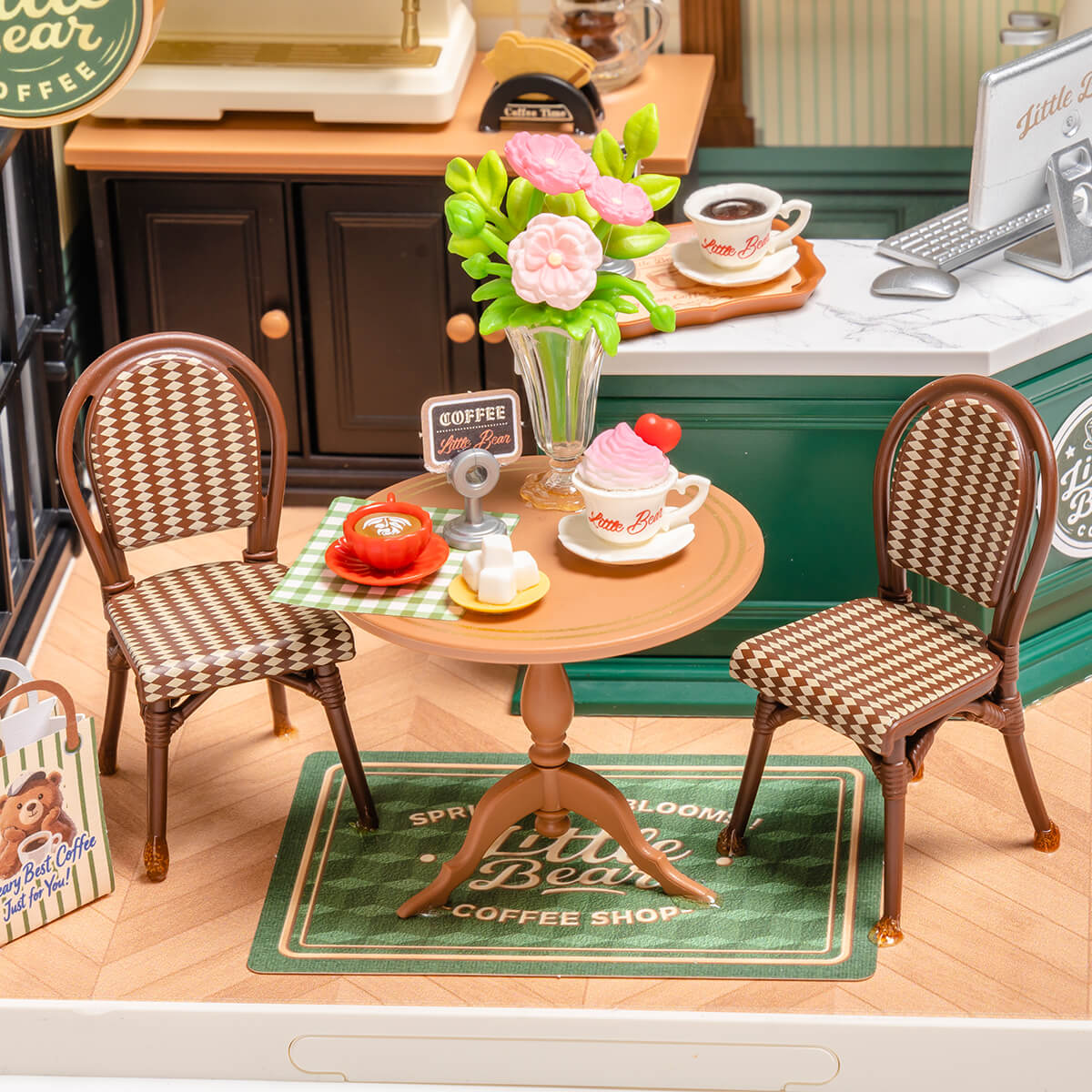Perfect Romance Cafe table detail with chairs, flowers, coffee cups, and dessert