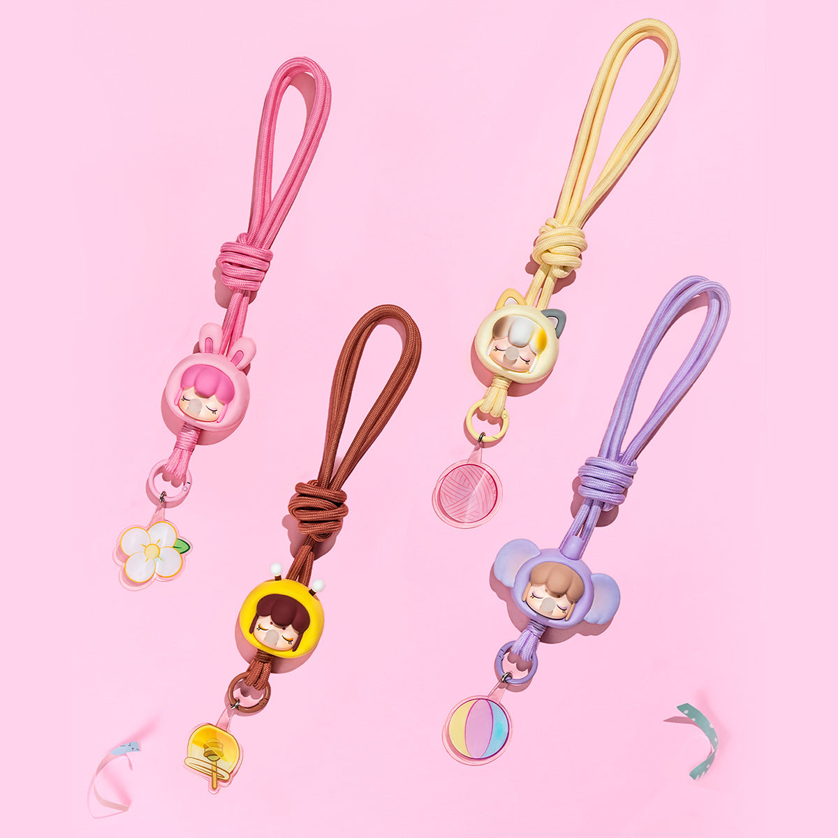 Baby Nanci Fluffy Party phone chain lineup in a pastel display scene