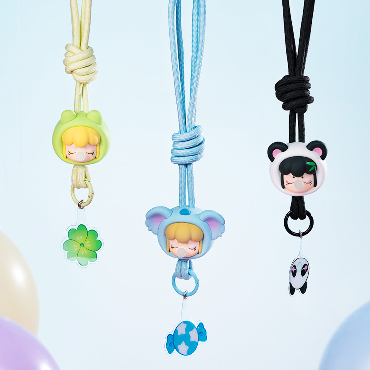 Baby Nanci Fluffy Party assorted phone chains hanging in a lineup