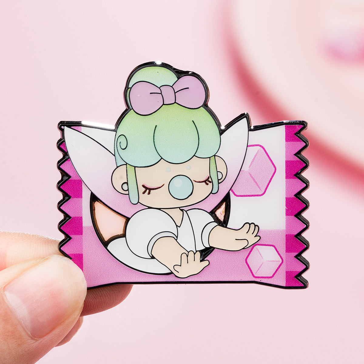 Nanci Sweet Time featured badge held in hand close-up