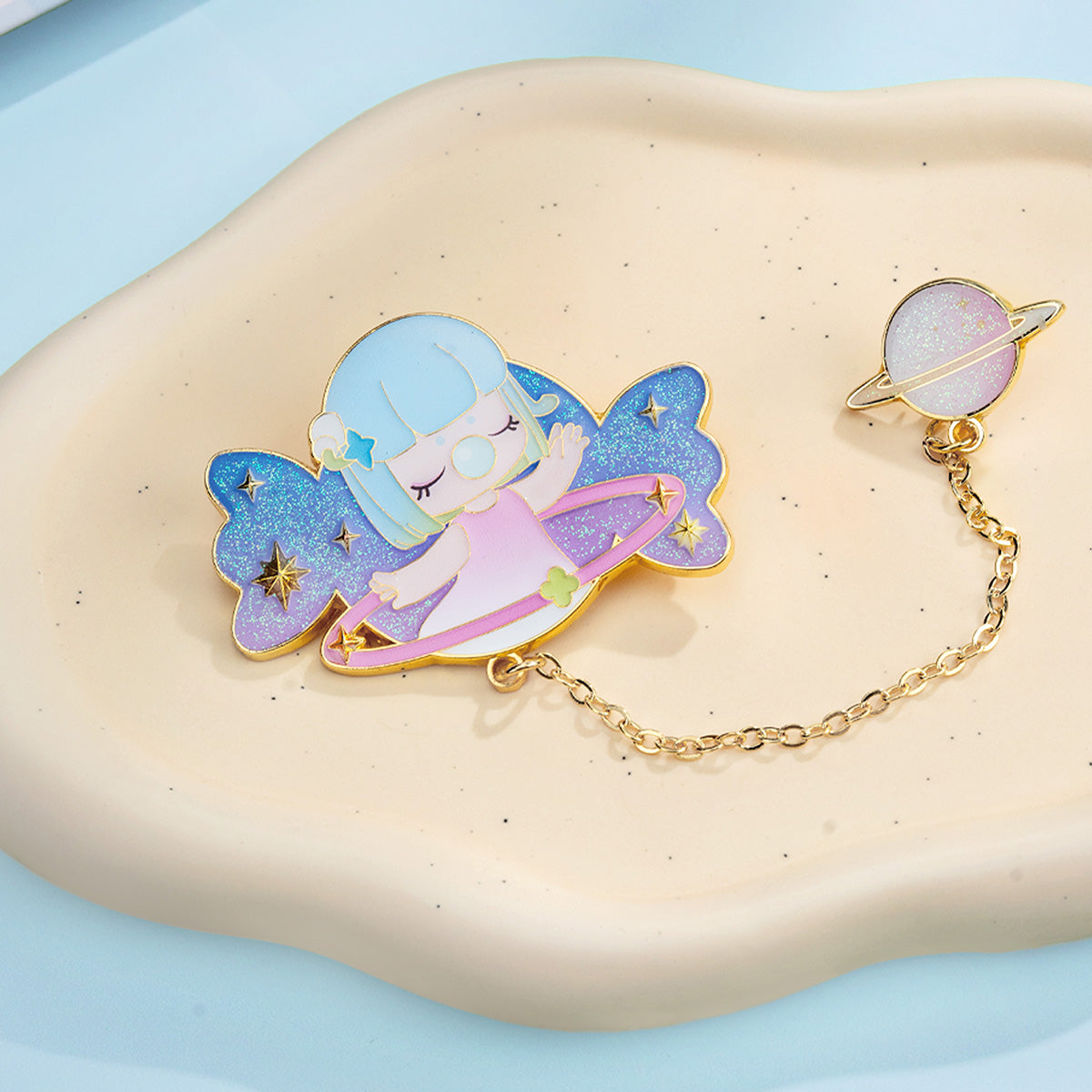 Nanci Sweet Time hidden edition winged badge on a tray
