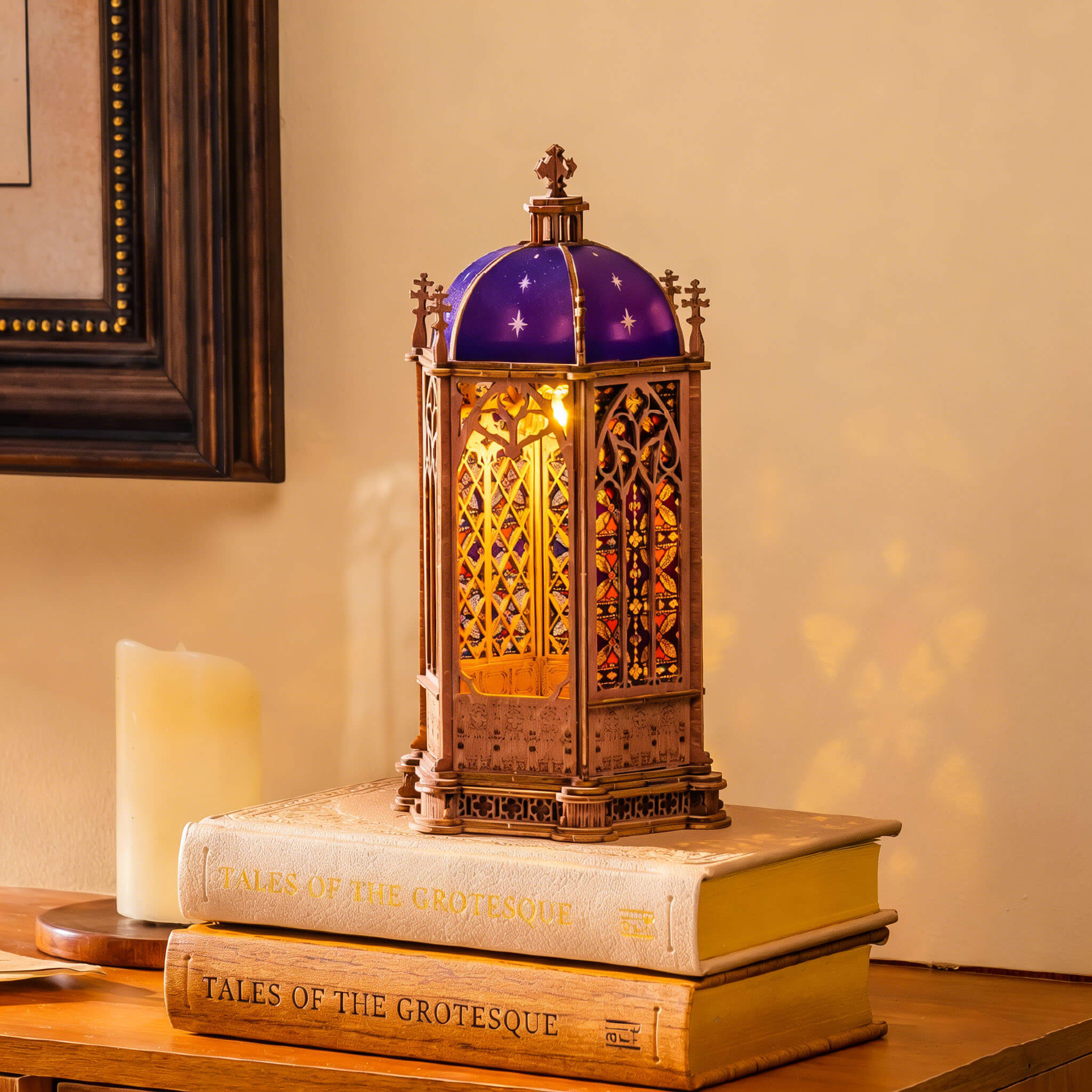 Starry Dome Cathedral TGA02 wooden puzzle lantern glowing on stacked books