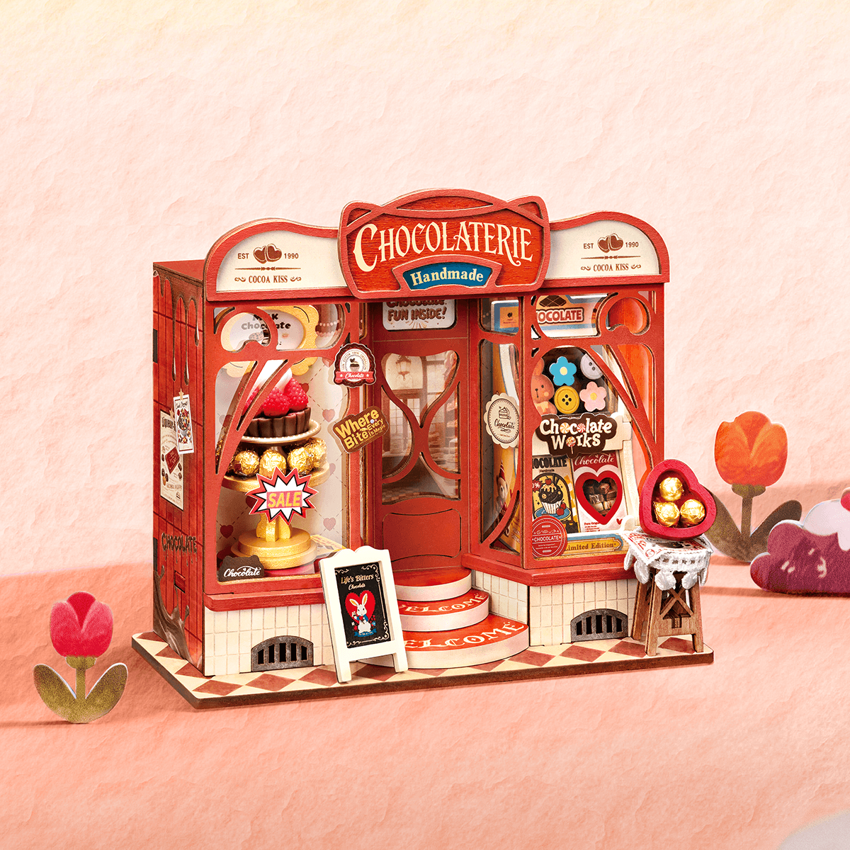Rolife Sweet Chocolate Shop DS046 tienda de chocolate en miniatura en una escena rosa estilizada