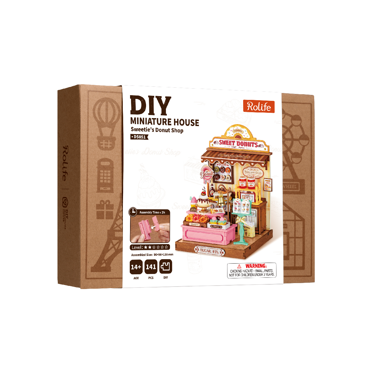 Sweetie's Donut Shop DS051 package beside completed pink bakery miniature model