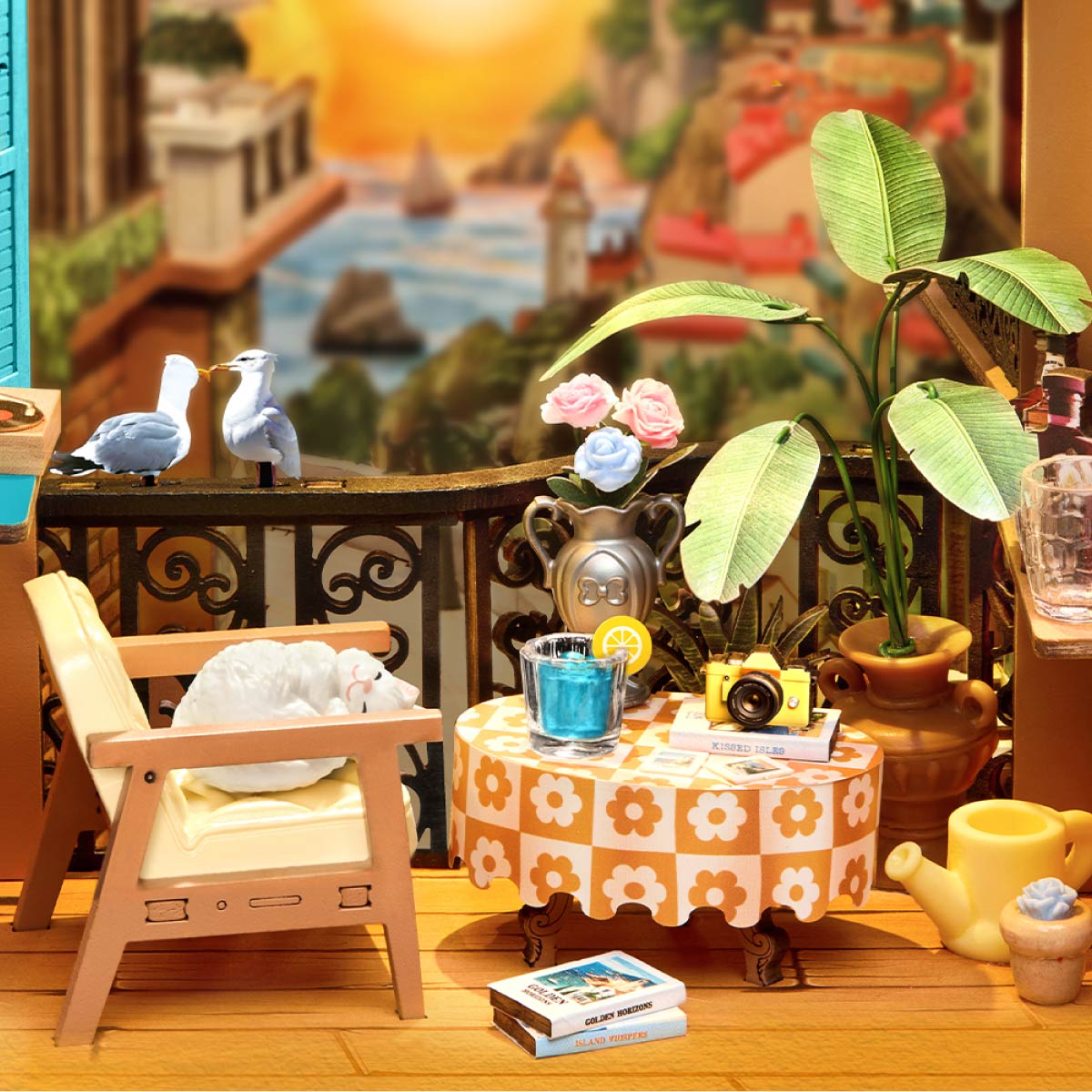 Rolife DIY Book Nook Kit Sunset Isle TGB18 terrace table and sleeping cat detail close-up