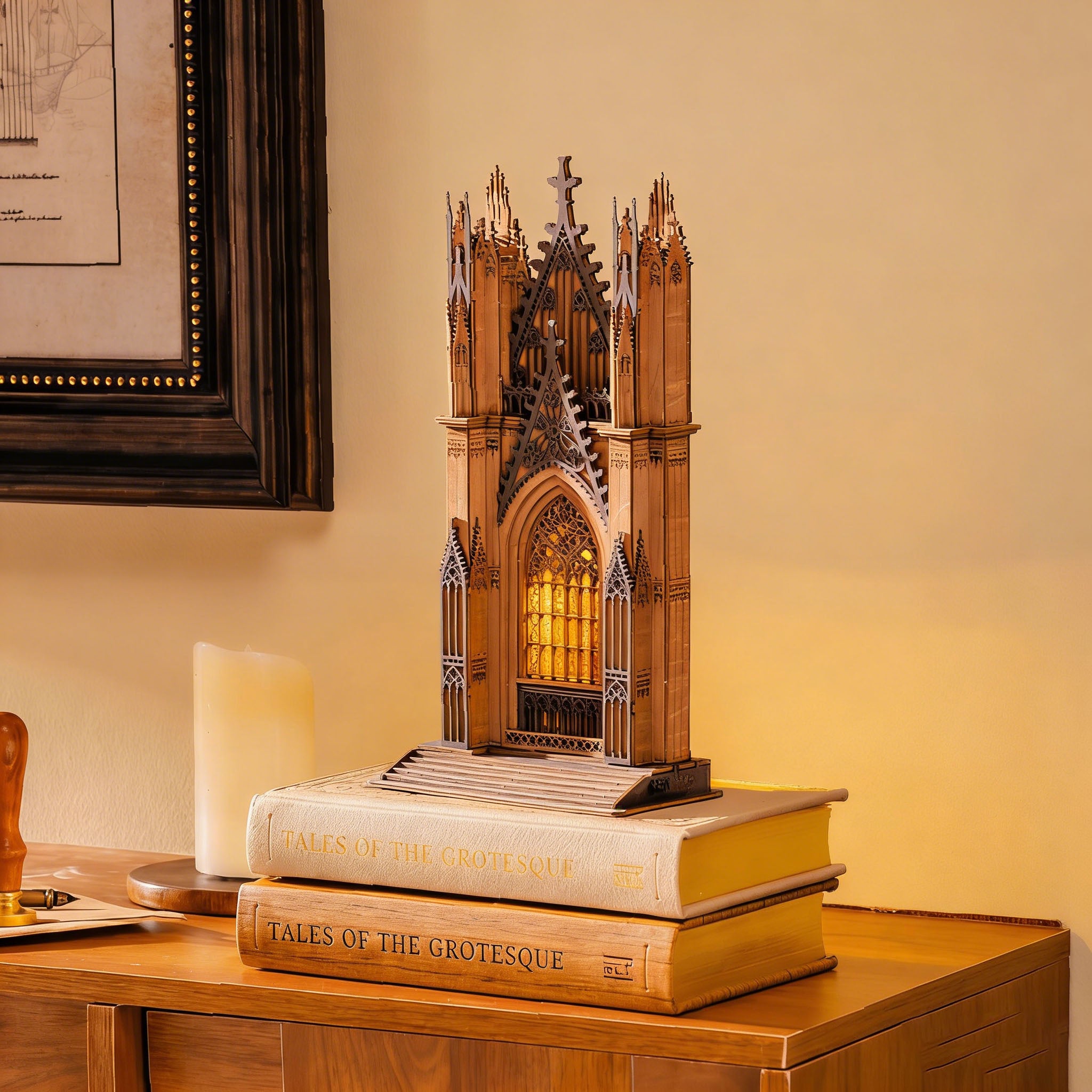 Twin-Tower Cathedral TGA01 wooden puzzle lantern glowing on stacked books