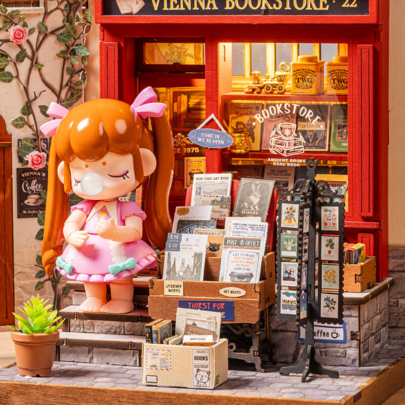 Librería de Viena DG183 primer plano de la vitrina, libros y detalles de figuras
