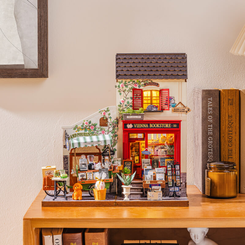 Aromatischer Kaffeewagen DG182 Kombination Anzeige mit Miniaturhaus der Wiener Buchhandlung
