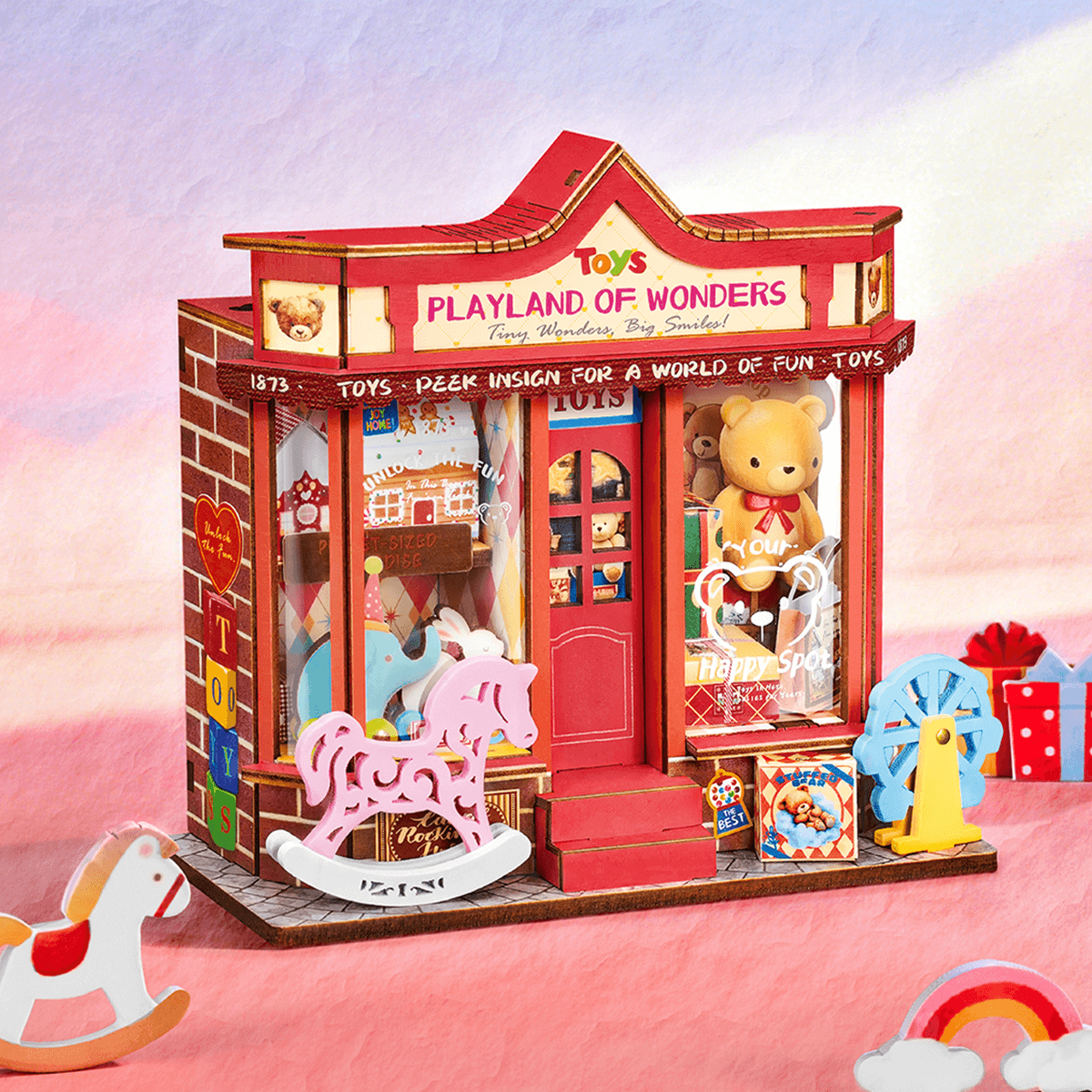 Rolife Whimsy Toy Shop DS044 miniatuur speelgoedwinkel in een gestileerde roze tentoonstellingsscène