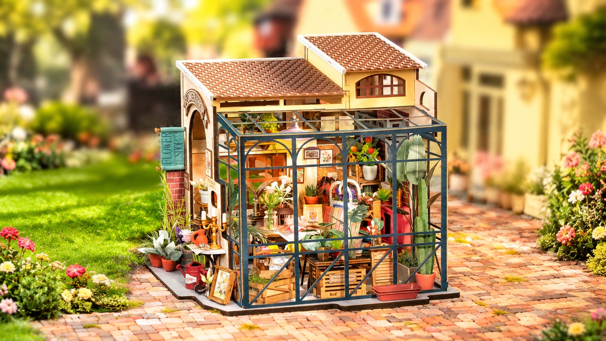 Emily's Flower Shop DG145 miniature florist shop with floral displays and a dark teal frame