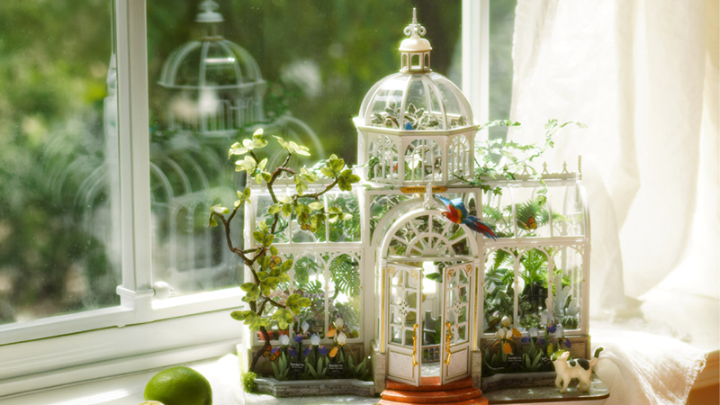 Create a peaceful green oasis filled with plants and flowers.