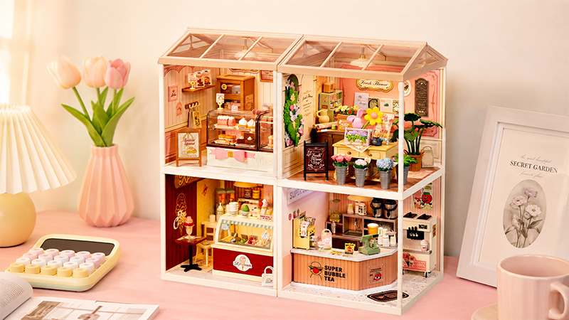 Build a colorful little shopping world filled with sweet treats, flowers, and cozy shops.