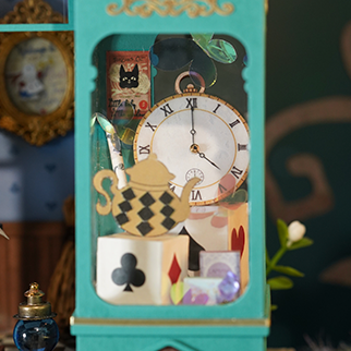 Alice's Tea Store DG156 clock display window with Wonderland details close-up
